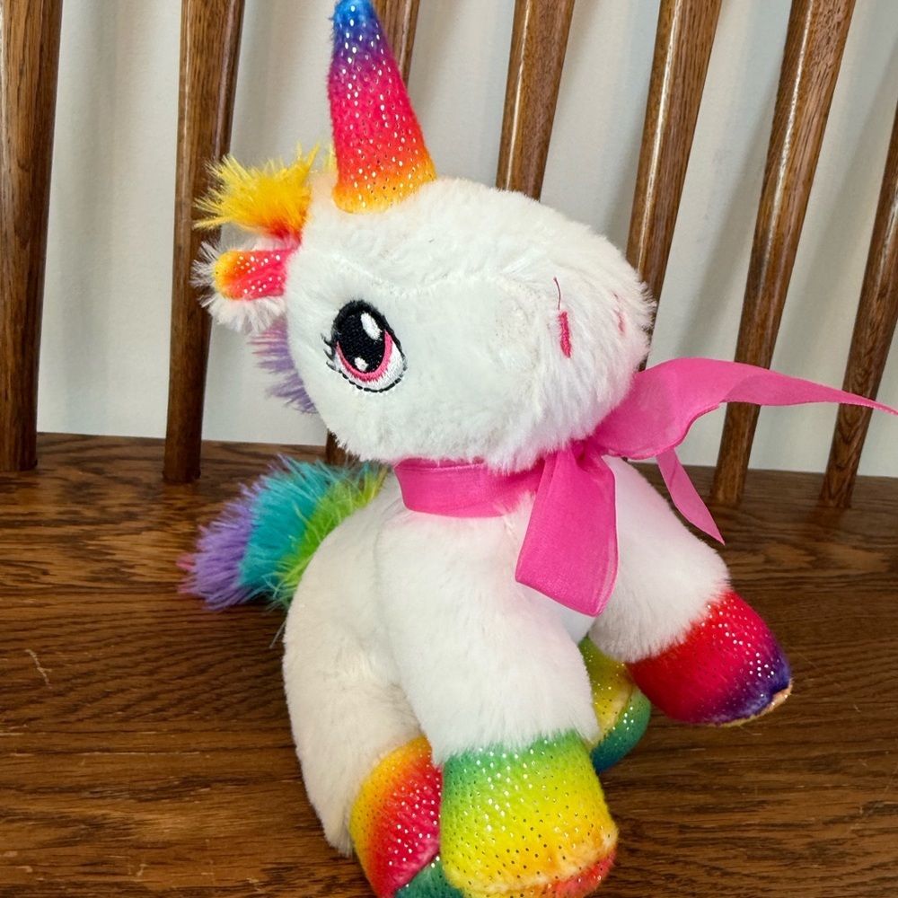 Dan Dee Unicorn Plush 7-inch version with white fur, a rainbow-colored horn